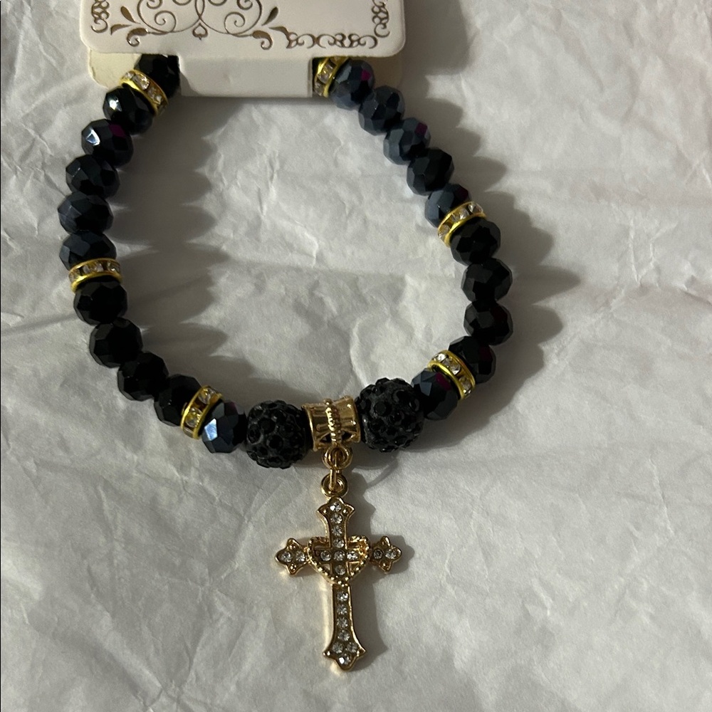 Elegant Black Beaded Bracelet with Gold Cross Charm